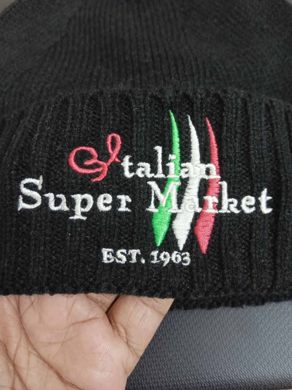 Black hat with yellow embroidery